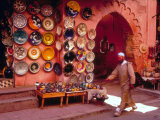 Muslim Man Walks by Wall of Moroccan Pottery  Marrakech  Morocco