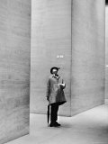 French Actor Jacques Tati Looking at the High Ceiling of an Office Lobby