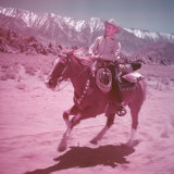 Actor/Singer Gene Autry Riding Horse at His Ranch in Ca