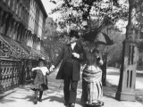 Incredibly Well Dressed Man  Woman and Child Walking by Perfect Brownstone Apartment Buildings