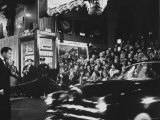 Crowd Watching From Bleacher Seats Set Up on the Right Side of Entrance to the RKO Pantages Theatre