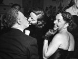 Rubinstein KissingTallulah Bankhead at a Party Thrown by Gossip Columnist Hedda Hopper for Bankhead