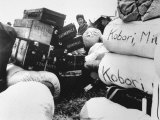 Evacuee of Japanese Ancestry Identifies Her Baggage at Assembly Center
