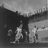 Navy Pilots Playing a Game of Basketball in the Elevator Well of the Aircraft Carrier USS Monterey