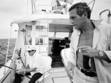Actor Paul Newman Fishing with a Friend
