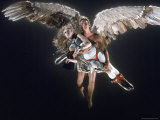 Actress Jane Fonda Being Carried by Guardian Angel in a Scene from Roger Vadim's Film 