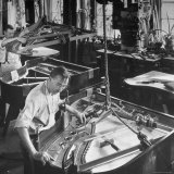 Workmen Installing Steel String Frames Into Grand Piano Cabinets at Steinway Piano Factory