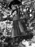 Italian Refugee Women Carrying Their Belongings in Baskets  While Fleeing Their Homes in WWII