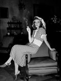 Katharine Hepburn in chair Smoking Cigarette in Scene from Broadway Show "The Philadelphia Story"
