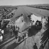 Spectators and Hot Rodders from the Nat Hot Rod Assoc at Drag Race on Quarter Mile Strip