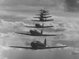 Nine Army Air Corps Bi-Place Pursuit Planes Flying in Formation with a Maximum Speed of 300 MPH