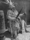 Bope Mabinshe  King of Bakuba Tribe  Dressed in Heavily Embroidered Tribal Costume  Holding a Spear