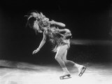 Figure Skater Sonja Henie in Costume Blowing Kisses to Her Audience During Hollywood Ice Review