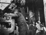 Man Working Newspaper Printing Press at Chicago Defender While Founder Robert S Abbott Checks Copy