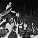 Dean Martin Pretending to Offer His Jacket to Fan  as Jerry Lewis is Watching