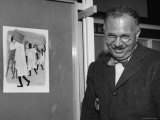 Ben Shahn Standing Beside His Design Contribution to Exhibition 