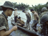 Nationalist S Vietnamese Soldiers Loading Viet Cong Prisoners Onto Canoe Like Boats in Mekong Delta