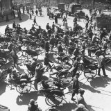 Richshaw's Loaded with Peddler's Pushcarts  Dollies Hand Trucks  Barrows  Pedi Cabs  and Bicycles