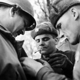 Pair of Russian Soldiers Exchanging Insignia with an American Army Captain