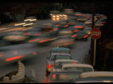 Line of Cars at Stop Sign Waiting to Enter Solid Wall of Racing Commuters on Pasadena Freeway