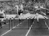 US Runner Fanny Blankers Koen Setting Olympic Record of 112 Seconds in 80 Meter Hurdles