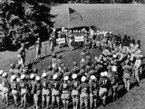 Boys in Circle for Ceremony Before Playing Young American Football League Games