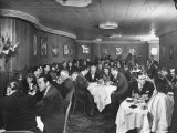 Actor Orson Welles at Table on Left with Cigar in His Mouth