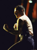 Singer Bono of Rock Group U2 Performing