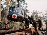 American 4th Battalion  173rd Airborne Brigade Soldiers Loading Wounded Onto a "Huey" Helicopter
