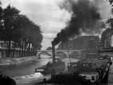 River Boat Smoke Passes along the River Seine