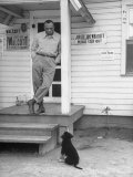 Boxer Joe Walcott Standing Outside Doorway of Building at Training Camp