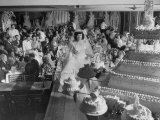 At Palumbo's Cafe  Bride Mrs Salvatore Cannella Walks Onto Stage  Facing a Revolving Cake Display
