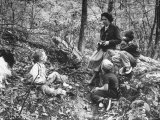 Biologist/Author Rachel Carson Holding Camera with Children and Dog in Woods Near Her Home
