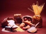 Arrangement of Earthy Foods Including Uncooked Barley  Cracked Oats  Wild Rice  and Various Pasta