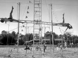 Student Circus Performers Revolve on Ladder  Helen Arnold and Jett Munroe Doing Acrobatics on Ends
