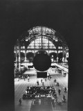 Interior of Penn Station Through Archway and Behind Suspended Clock  with Ceiling Ironwork