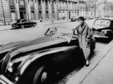 Authoress Francoise Segan Standing Beside Her Jaguar