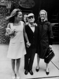 Lee Radziwill  Truman Capote  and Jane Howard Walking Arm in Arm While Leaving the Ivanhoe Theater