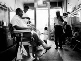 Musician Louis Armstrong in His Neighborhood Barber Shop