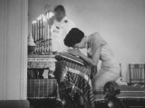Queen Sirikit Praying During Buddhist Service