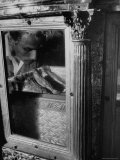 Pilgrim looks at Saint Francis Xavier's Missing Toe That Isabel de Carone Bit Off