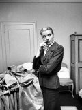 Actress Grace Kelly Packing Clothing Prior to Her Wedding to Prince Rainier