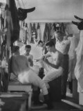 Jockey Willie Hartack  in the Locker Room with Other Jockies