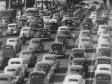 Lines of Traffic Heading South Down Olive Street  Young Boy Selling Newspapers