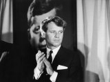 Robert F Kennedy Campaigning in Front of Poster Portrait of His Brother President John F Kennedy