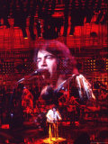 Multiple Exposures of Singer Neil Diamond Performing on Stage