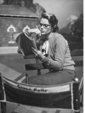 Actress Grace Kelly Studying Script for Her Role of Georgie in "The Country Girl" on movie set