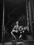 Playwright Tennessee Williams Sitting on Theater Set of His Play "Streetcar Named Desire"