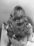 Actress Veronica Lake Posing with Her Glorious  Wavy Honey Blond Hair Cascading over Her Shoulders