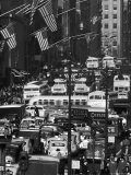 Pre-Christmas Holiday Traffic on 57th Avenue  Teeming with Double Decker Busses  Trucks and Cars
